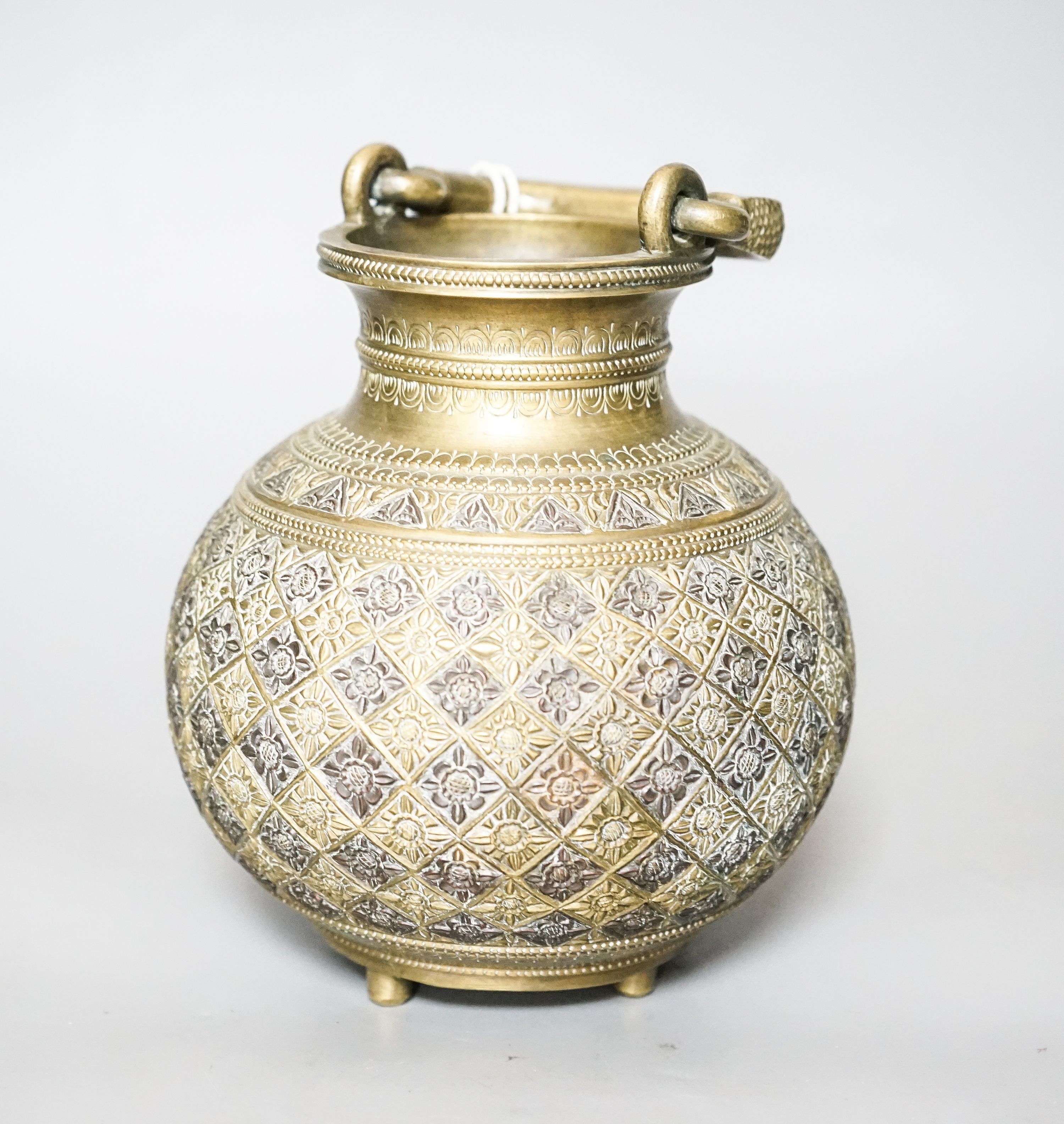An Indian deccani bronze and copper water carrier 17cm